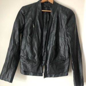 Black faux leather jacket size L with zipper accent on sleeves